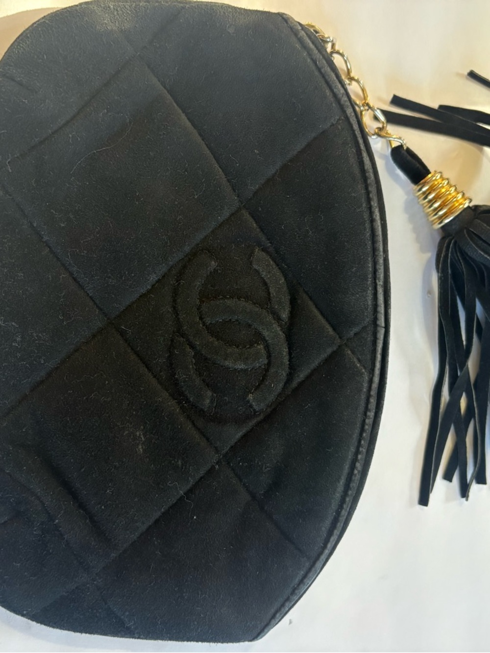 CHANEL Black Quilted Suede Cosmetic Pouch with Gold Tassel